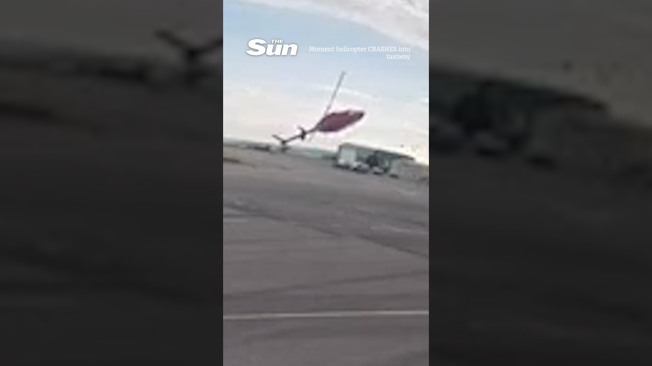Moment helicopter CRASHES into taxiway