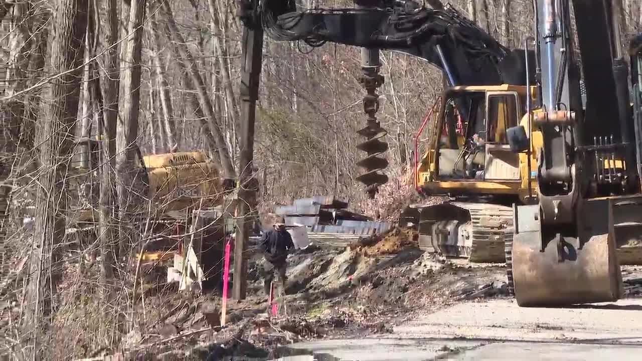Construction underway on repairs to road nearly a year after slip