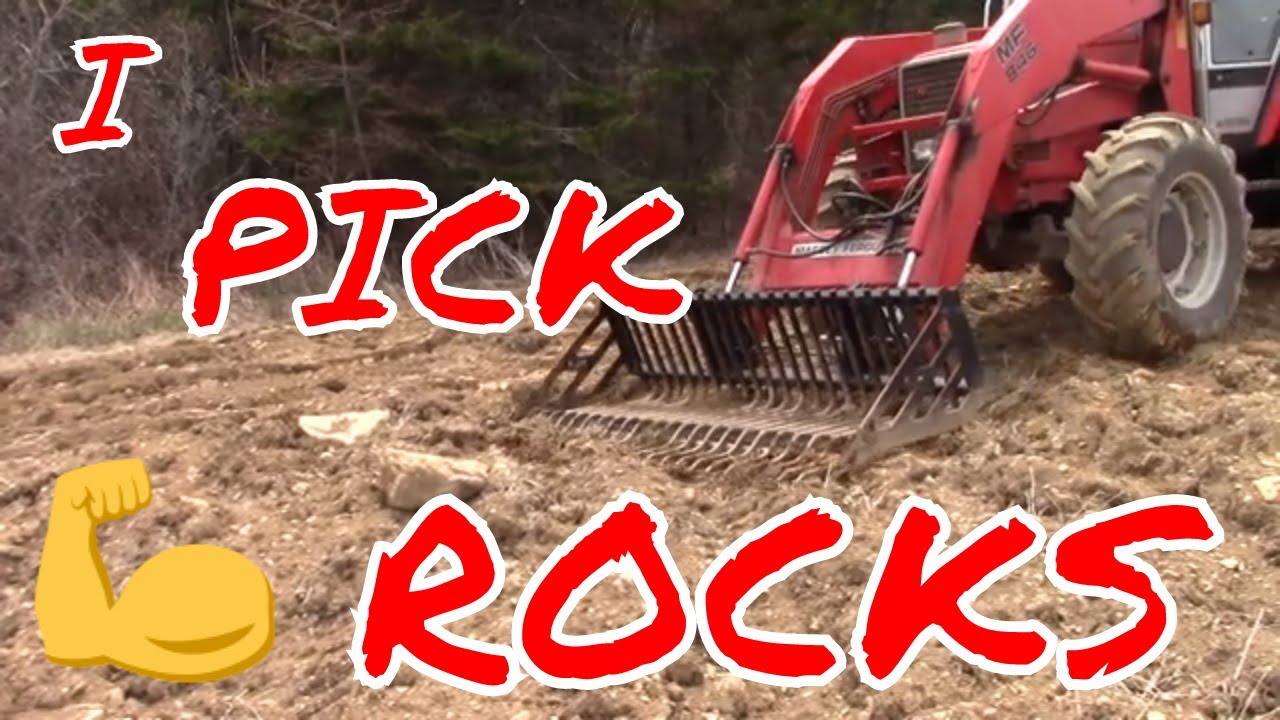 Picking Rocks with Massey 3070 HLA Rock Bucket