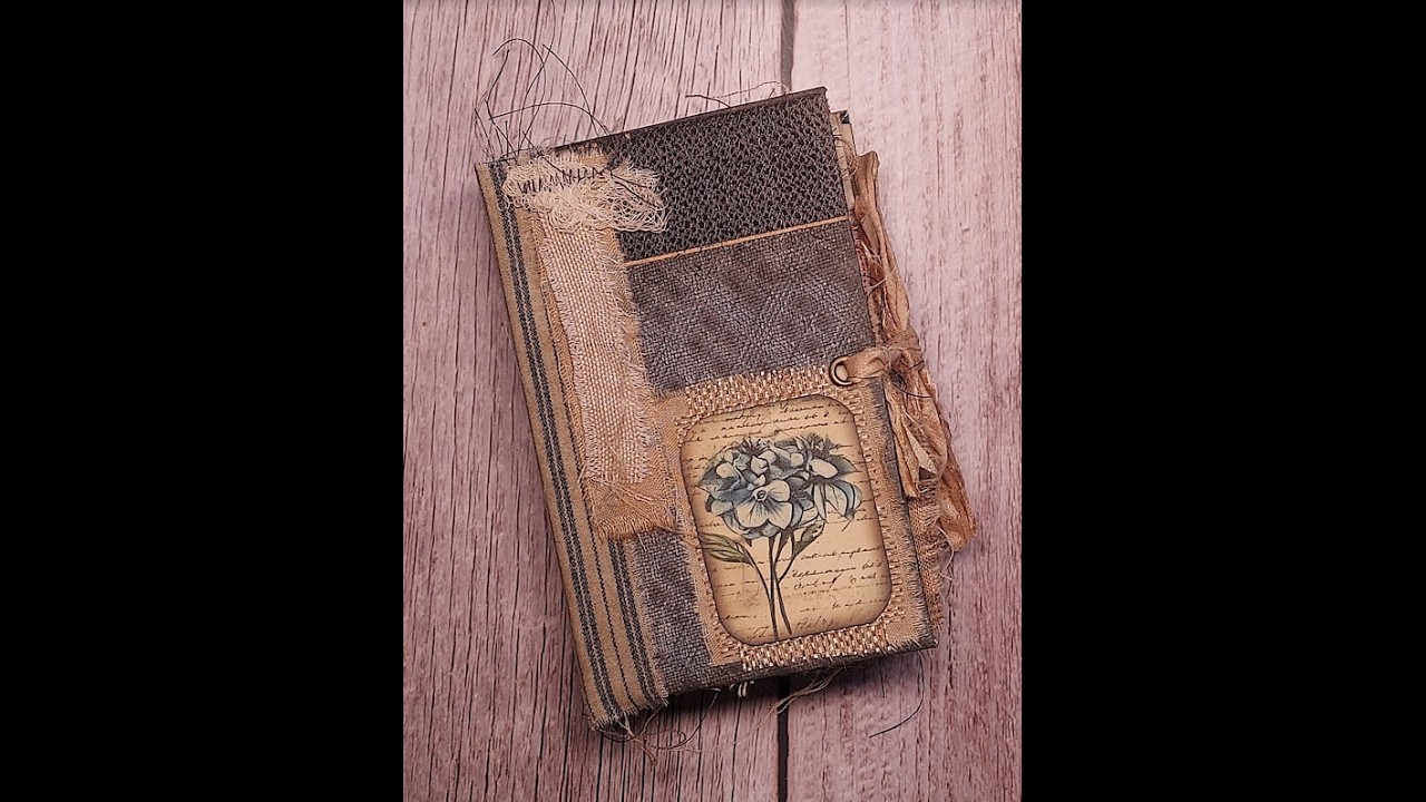 Threads and Faded Ink, a handmade very small grungy junk journal, that fits in the palm of your hand