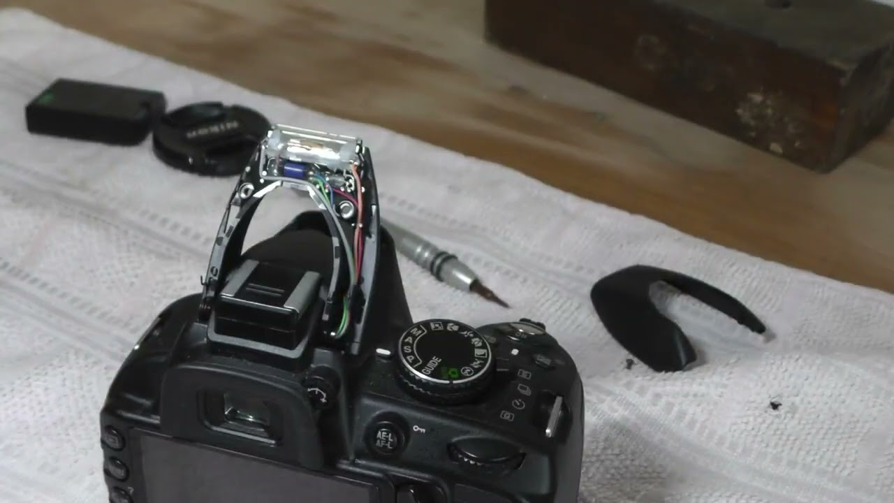 Руководство по ремонту вспышки Nikon D3100: замена лампы (ксеноновой трубки) и пружины выдвижения