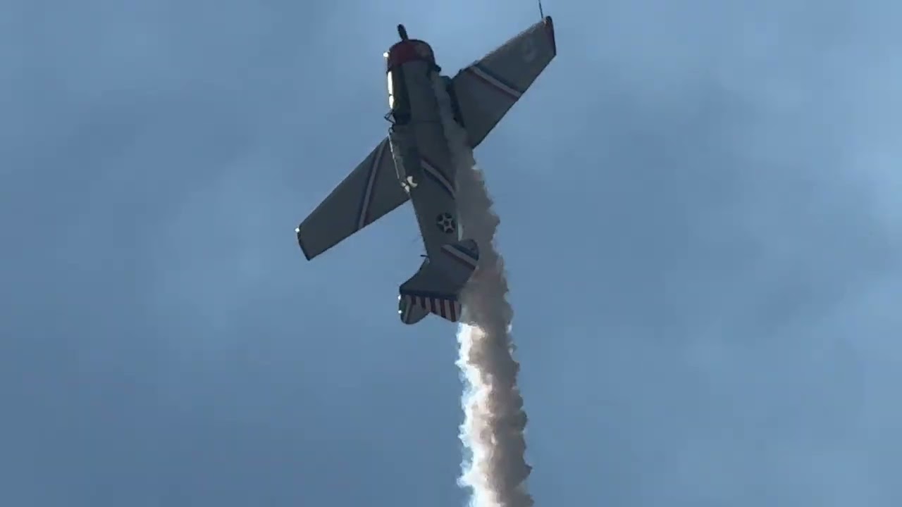 Aerobics at the ￼Labelle Florida airshow T6 plane doing loops