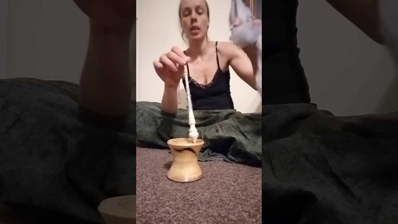 Long draw, twist, and spinning a Russian support spindle