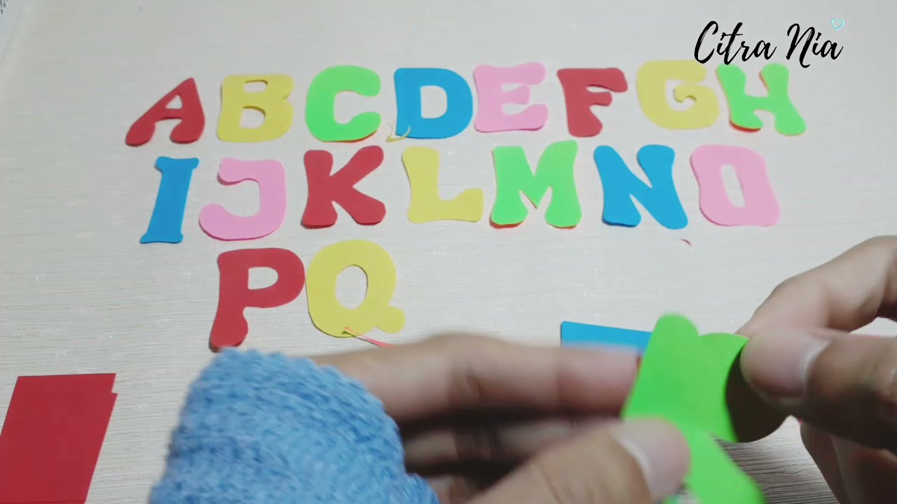 Membuat huruf besar (kapital) dari kertas tanpa pola
