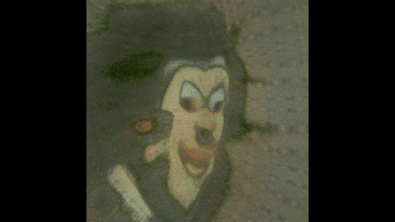 "a cartoon goofy character walking in the street"