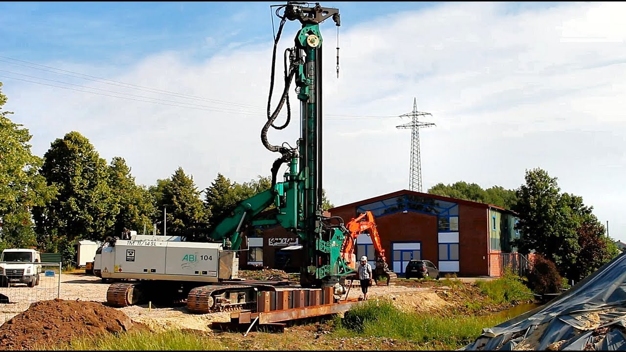 Rammgerät ABI TM 11/14 SL u. Hitachi Zaxis 180LC / Piling a sheet pile wall with ABI TM 11/14 SL