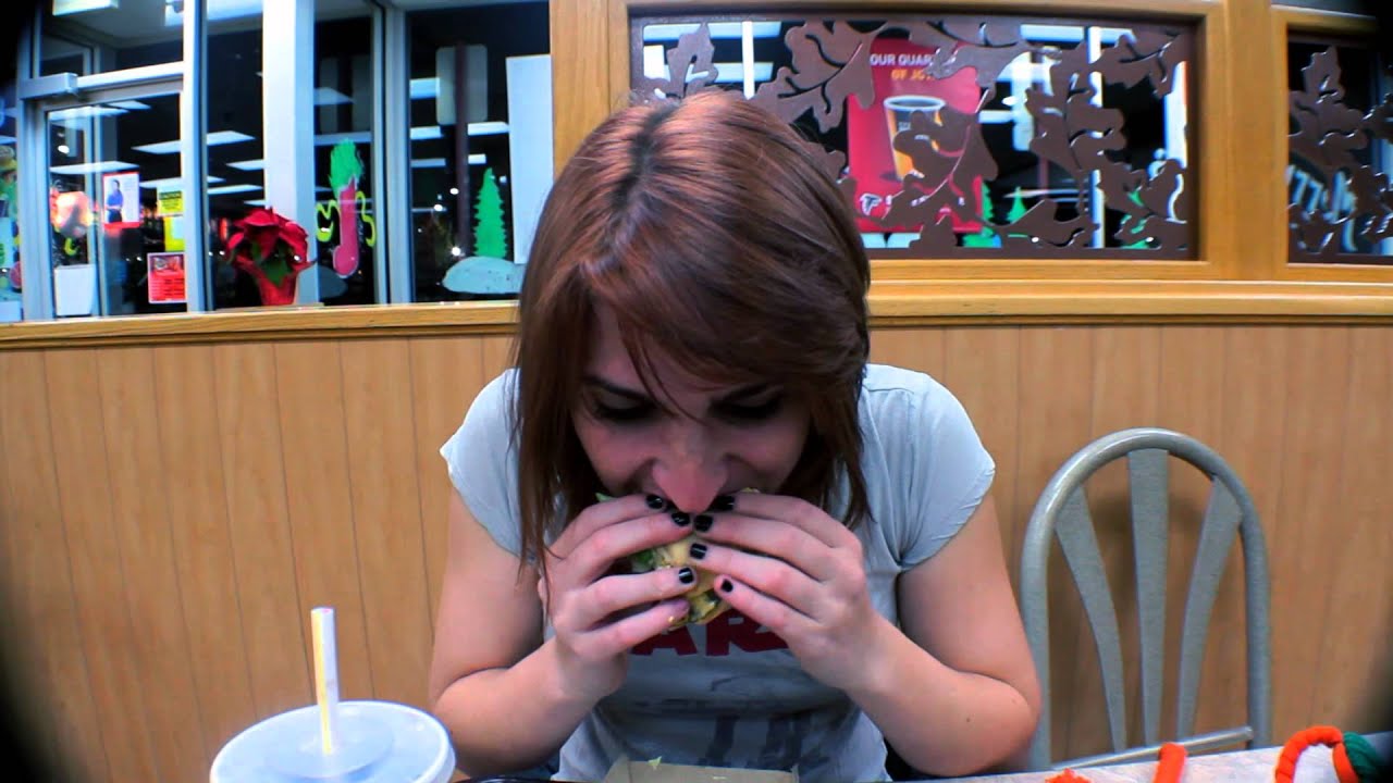 Tiny girl eats Big Mac in 1 minute
