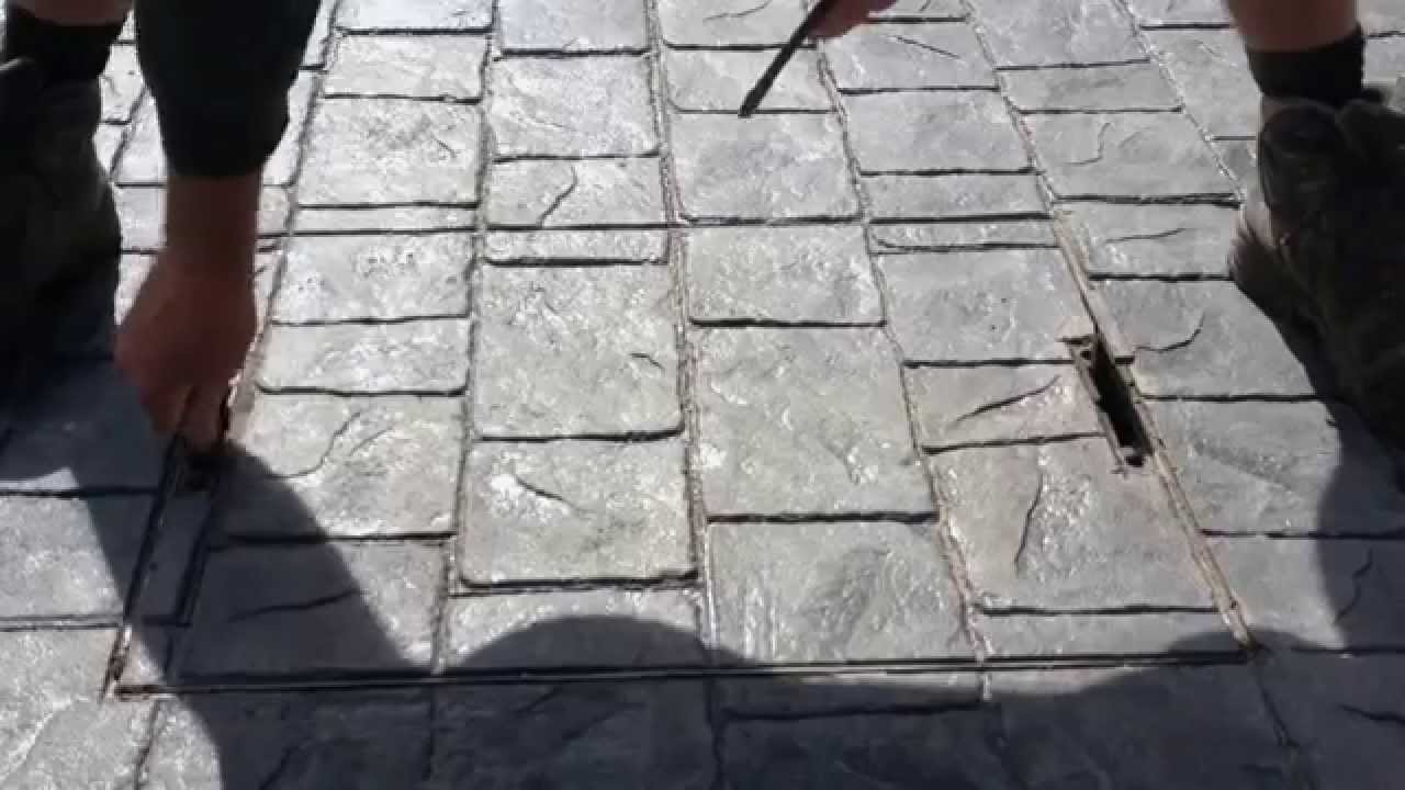 How to use a recessed manhole cover with a Pattern Imprinted Concrete / Stamped Concrete Driveway
