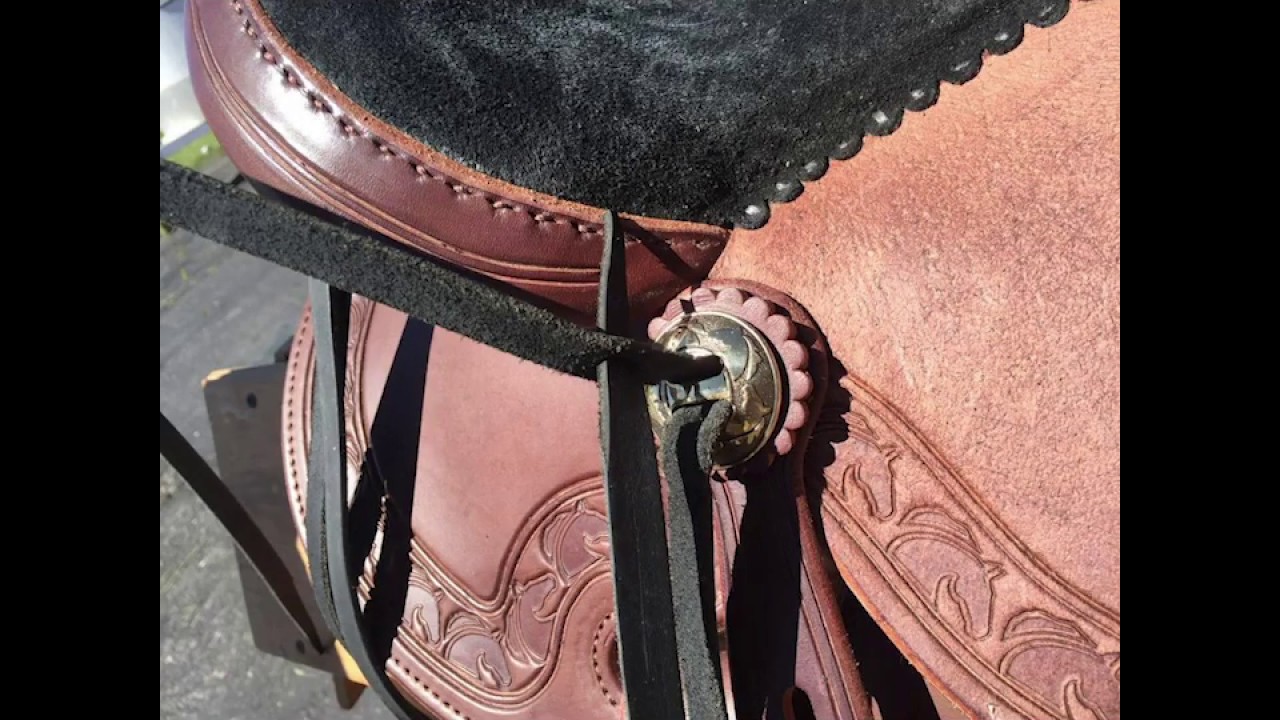 Changing out your Saddle Strings on a Western Saddle with slotted conchos