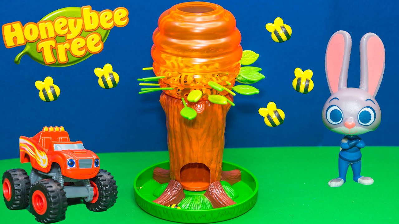 P;laying the Honey Bee Tree Game with Blaze against Zootopia Toys