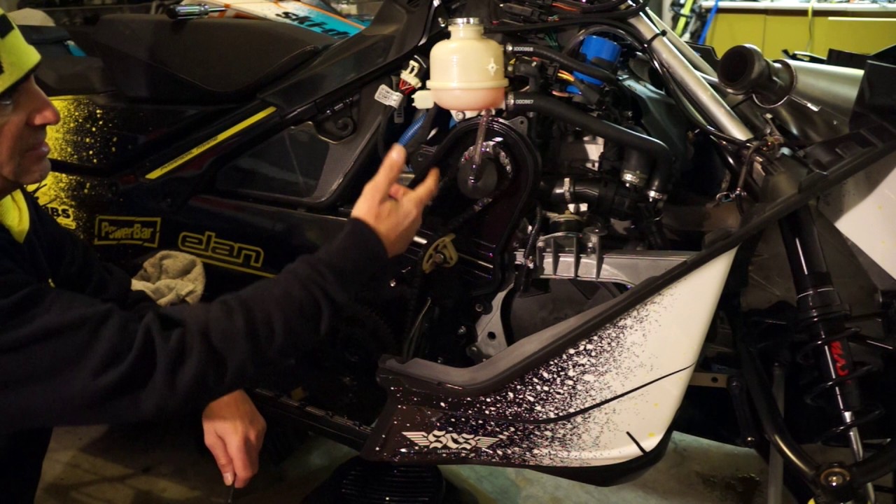 Регулировка цепи и замена масла Ski-Doo Summit Rev G4 850
