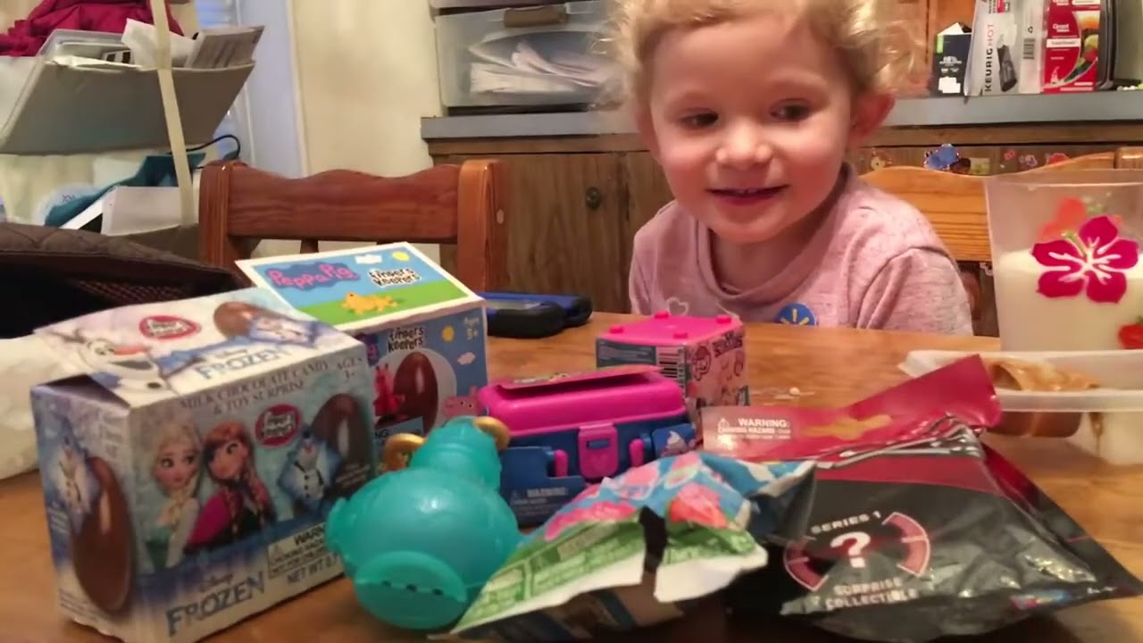 Mom and Daughter play Candy Land and open Surprise Toys