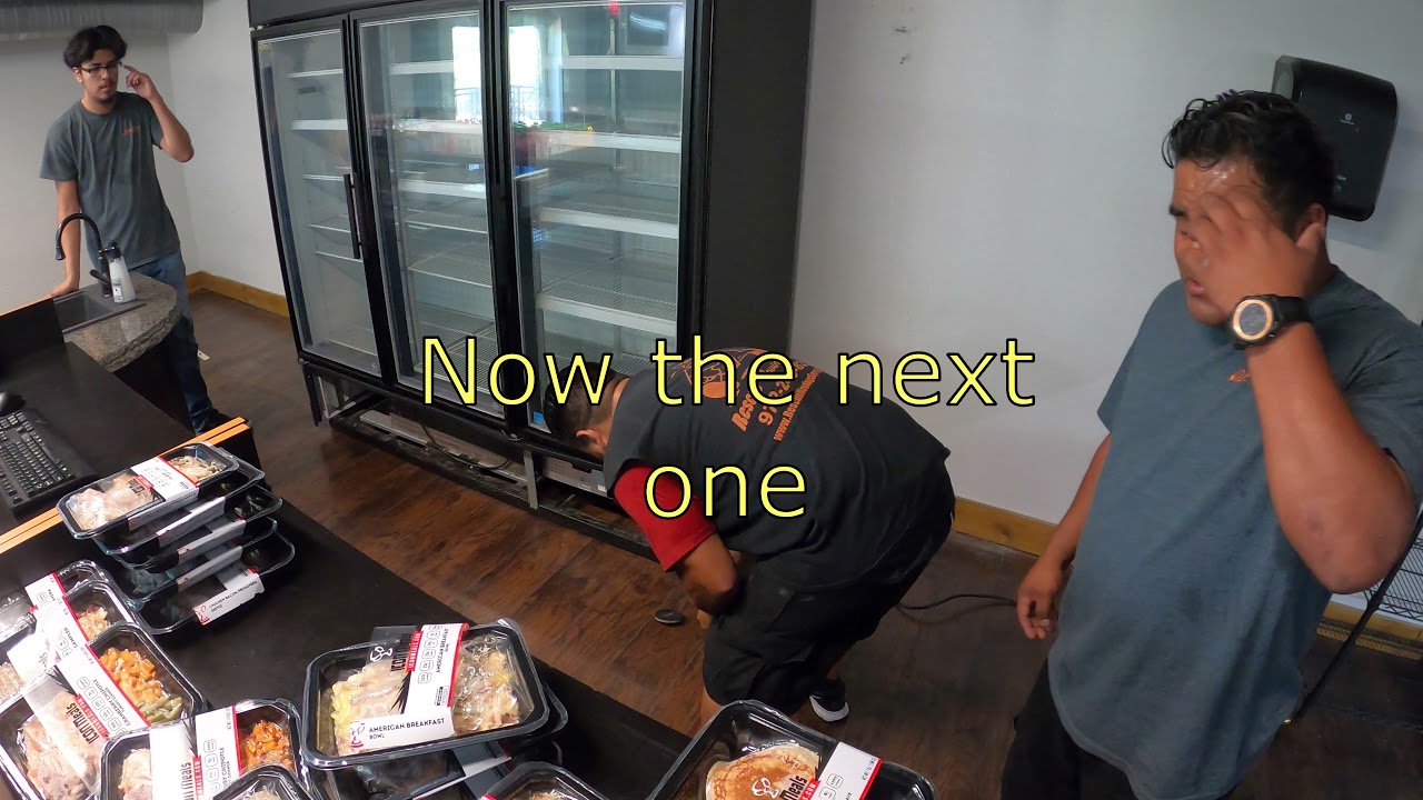 Moving a 3 door commercial refrigerator downstairs in Dallas by Rescue Movers (972) 249-8233 part 1
