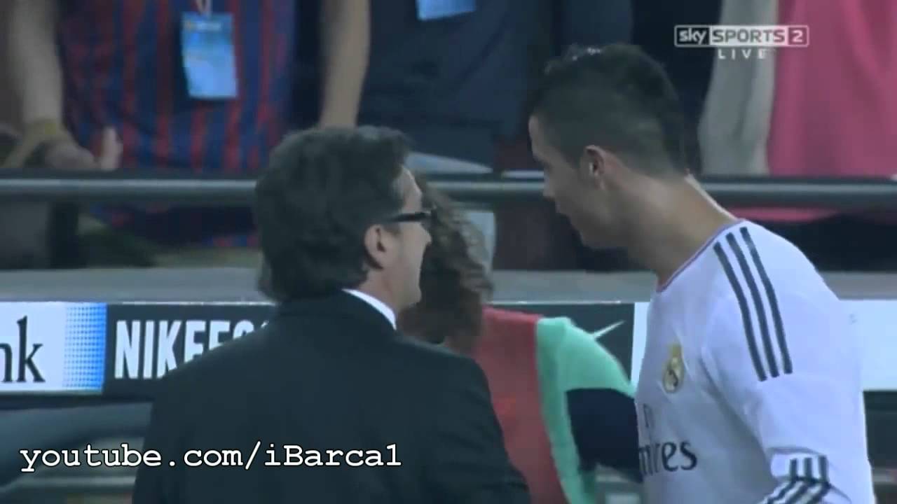Cristiano Ronaldo talking with Carles Puyol about the penalty after the match