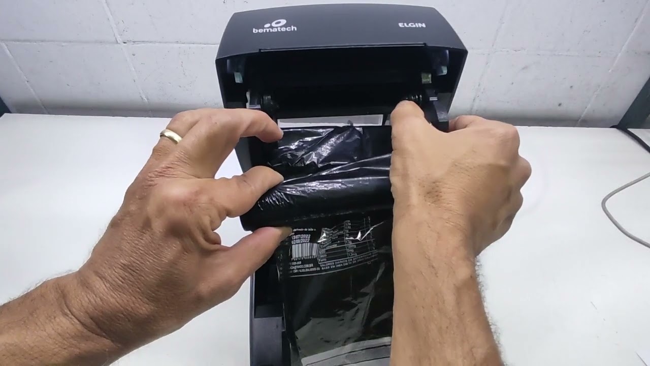 Como fazer a troca o rolo de etiquetas e  RIBBON na impressora térmica BEMATECH ELGIN L42 PRO.