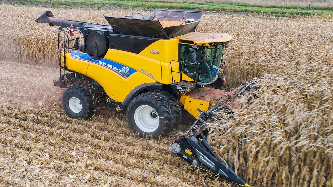 New Holland CR8.90 combine with Geringhoff 12 row folding corn head harvesting corn in Michigan
