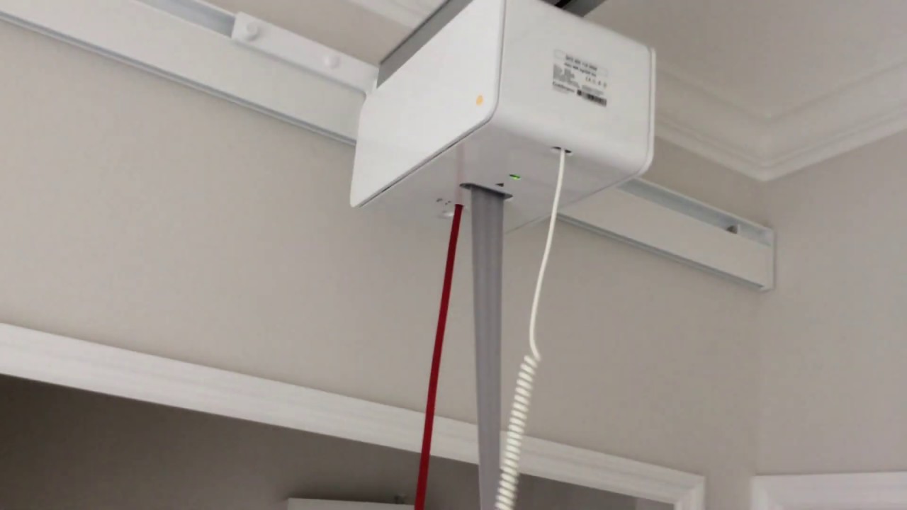 Guldmann GH3 Room Covering Hoist using the wall rail system joe@cvimedical.biz