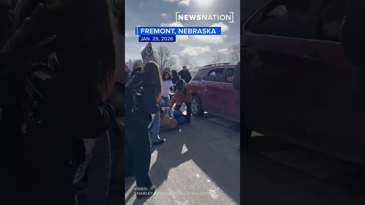 High school student protesting ICE hit by car with Trump flag