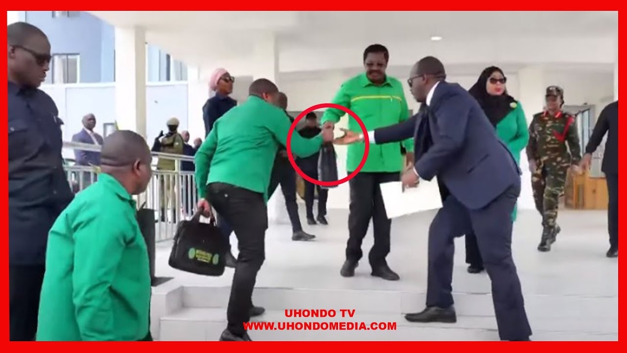 MBWEMBWE ZA WALINZI WAKIGOMBEA KUKILINDA KIBEGI CHA FOM