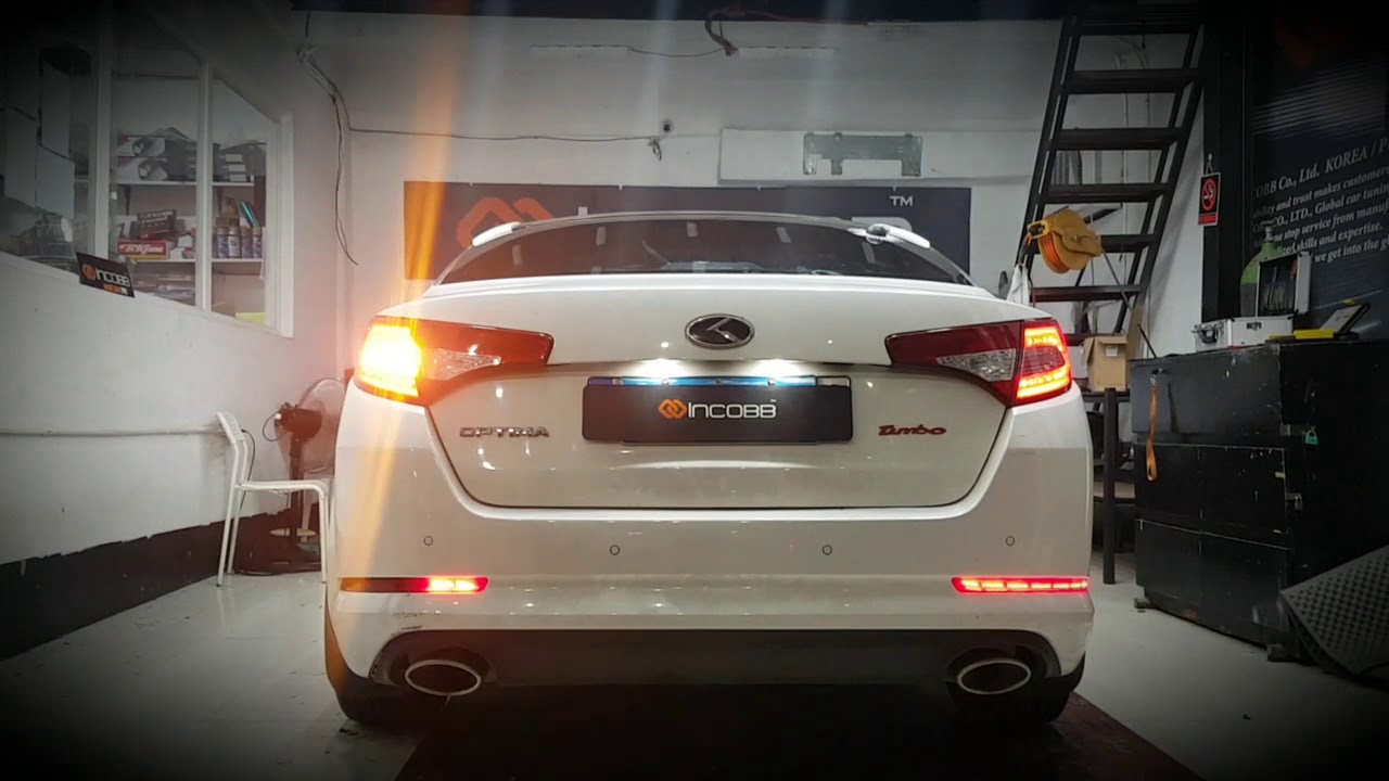 kia optima rear bumper reflector