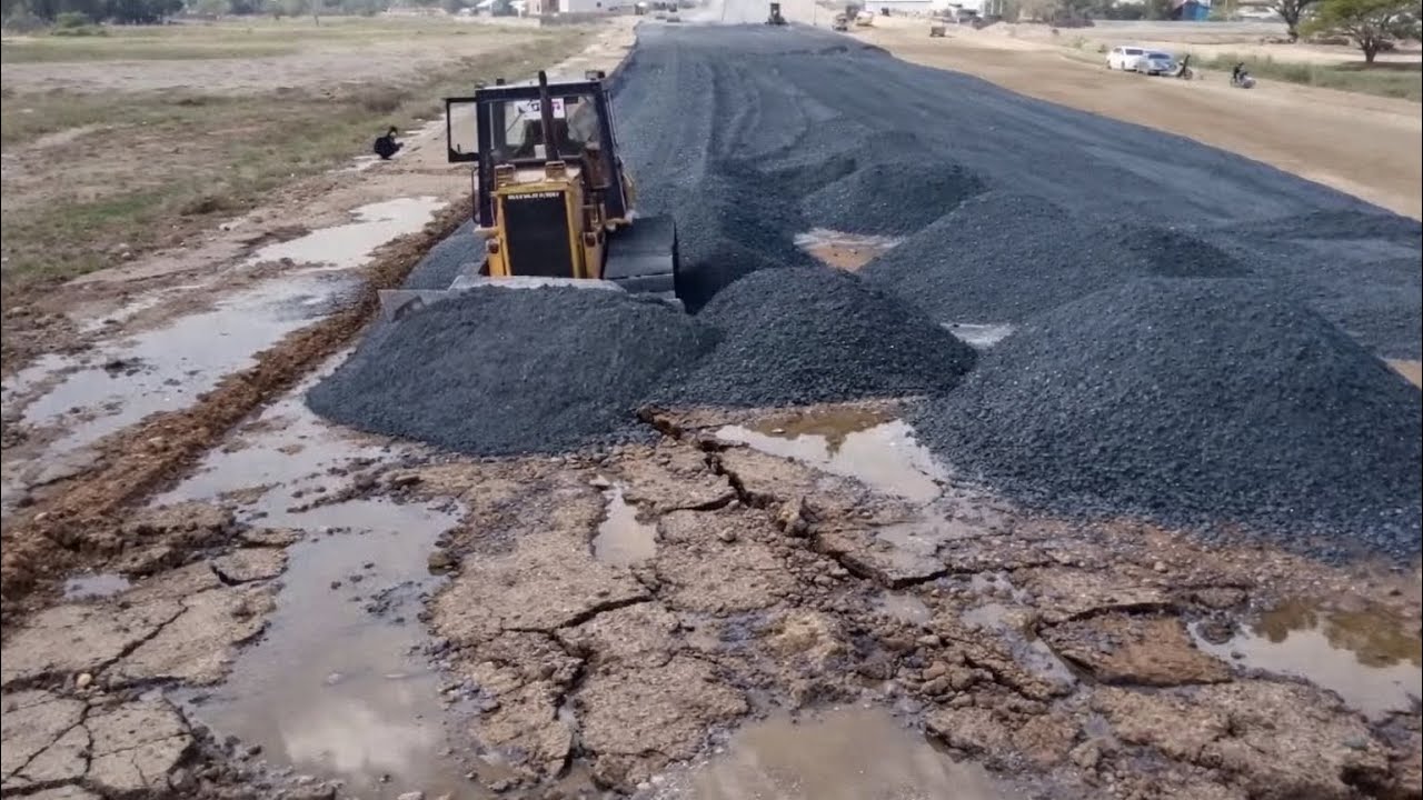 Komatsu Dozer Pushing Gravel Coverage The High Way Road