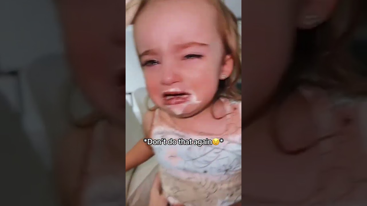 TAKING ICE CREAM FROM A TODDLER