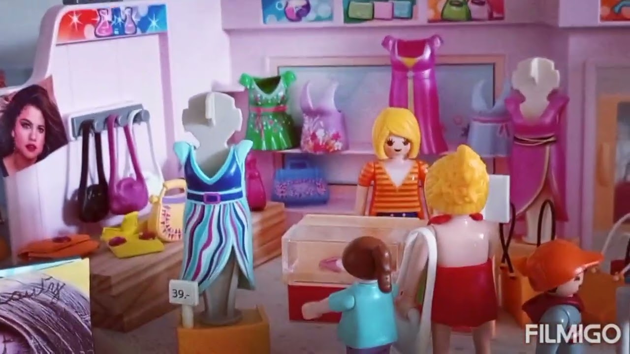 Chloé en français présente une histoire Playmobil : on se fait  voler dans les galeries commerciales