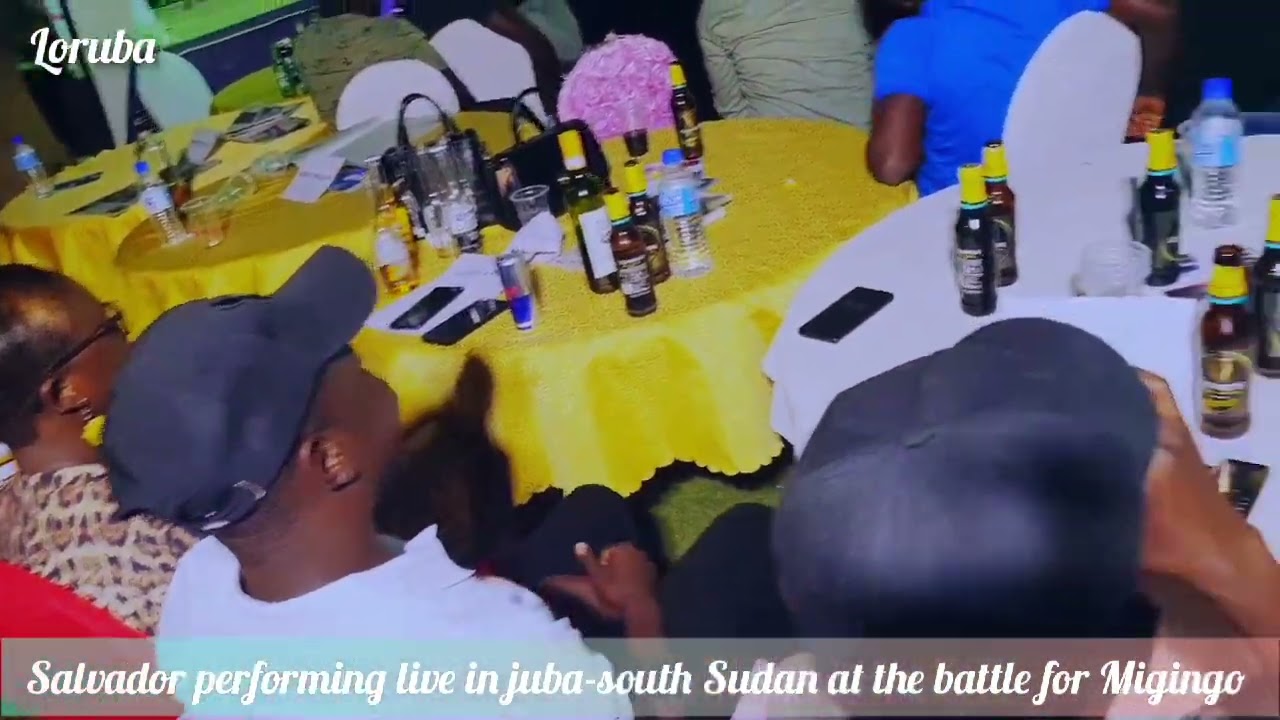 Patrick Salvador bends a female fan on stage in Juba South Sudan