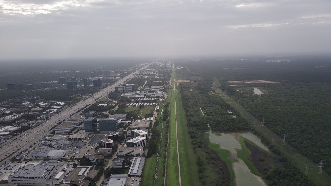 Flying Over The Addicks Dam On North Kirkwood In Houston (4K Drone)