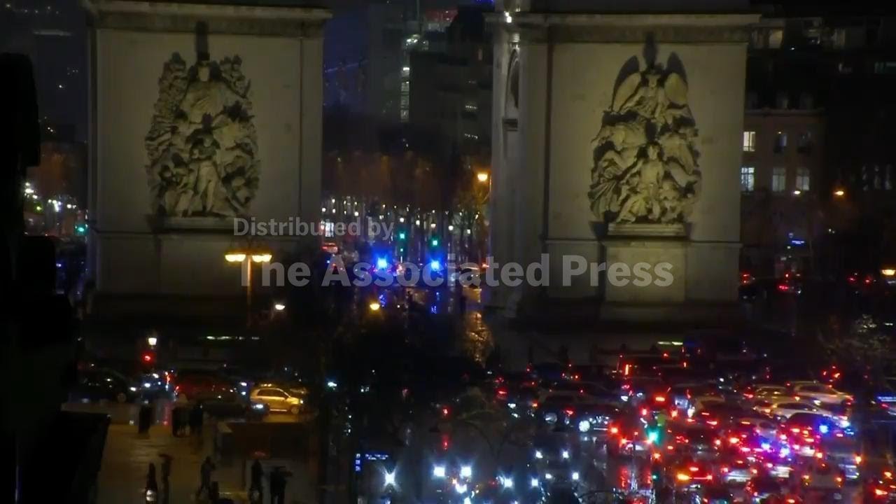 Paris police shoot and injure a knife-wielding man who tried to attack officers at Arc de Triomphe
