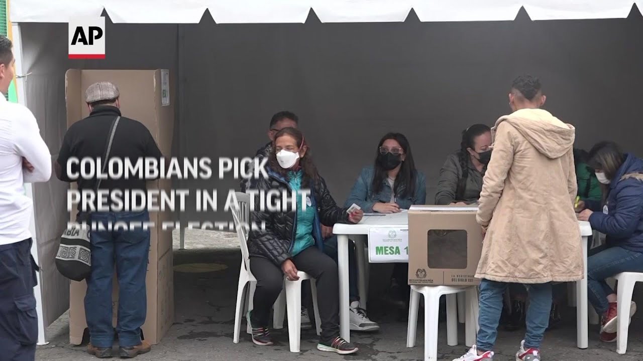 Colombians pick president in a tight runoff election