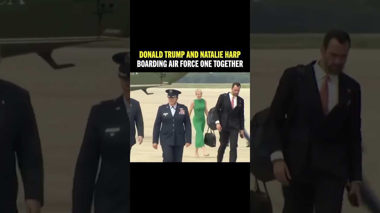 A grinning Natalie Harp follows Donald Trump as they board Air Force One