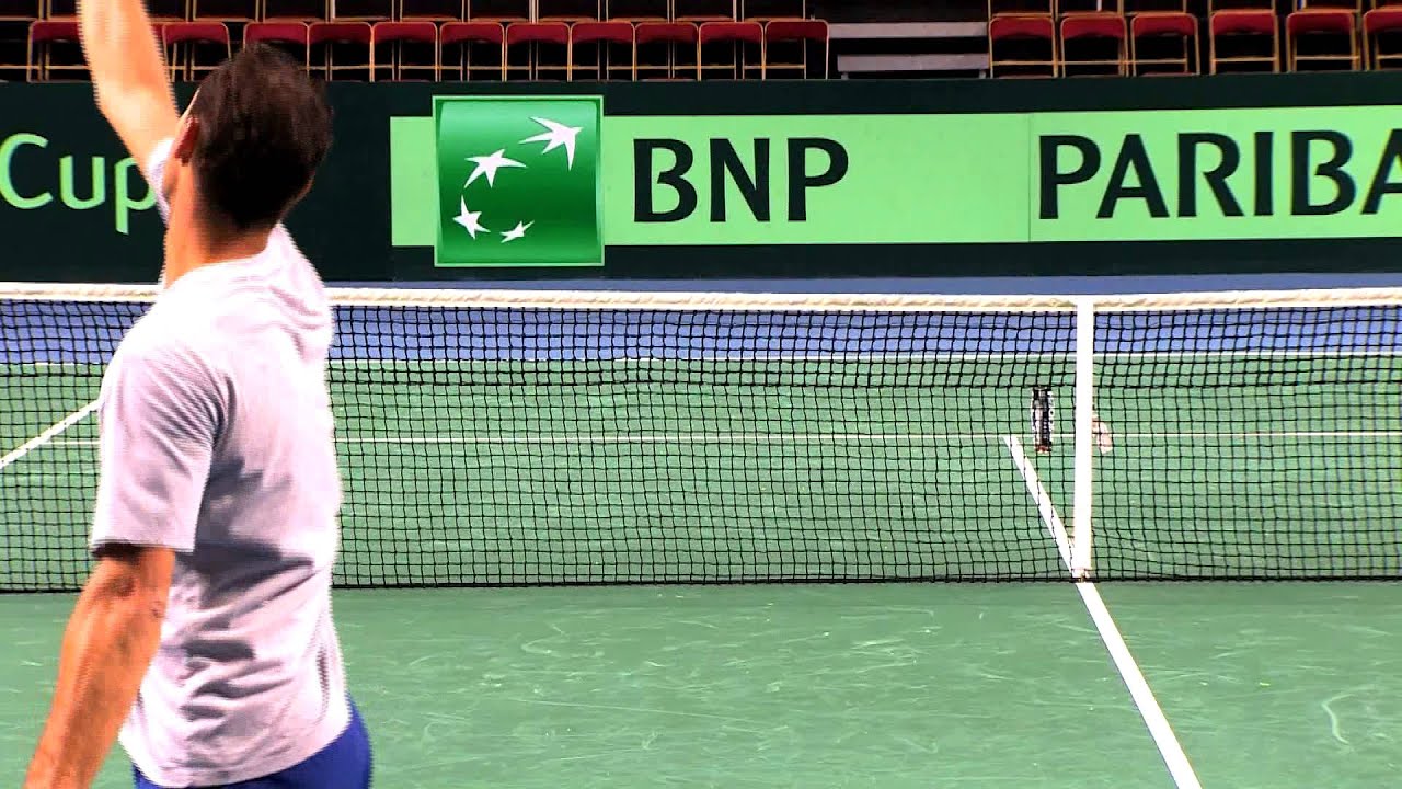 Michael Llodra (FRA) - Target practice on a tennis court