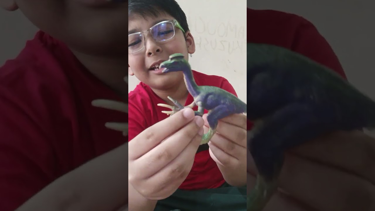 Showing you my Dinosaurs but holding their leg so you could take a better look.
