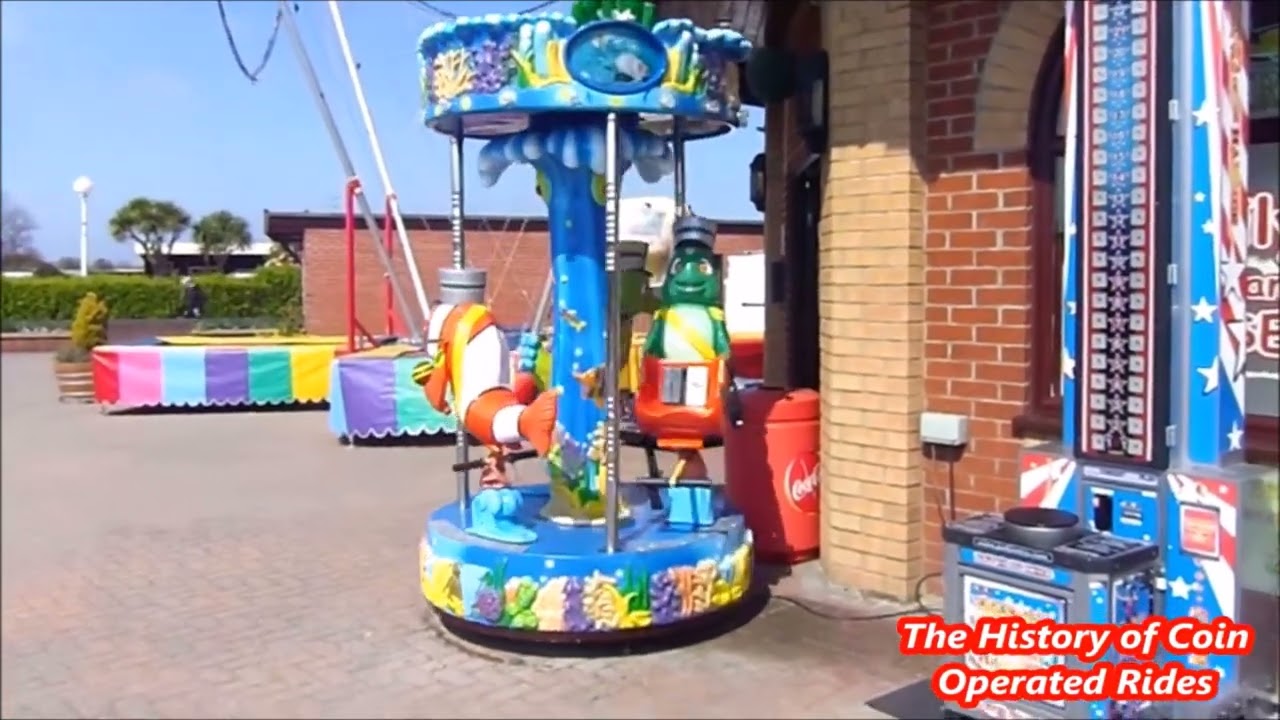 2000s Universal Space Coin Operated Roundabout Kiddie Ride - Ocean Carousel