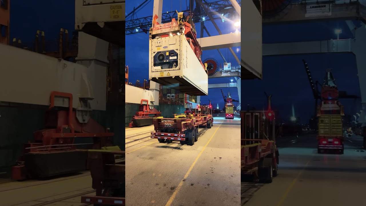 40 Foot Reefer Container being loaded onto a shunter terminal tractor truck