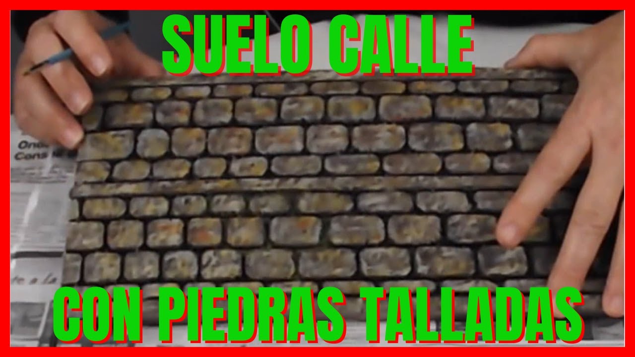 Suelo calle con piedras talladas