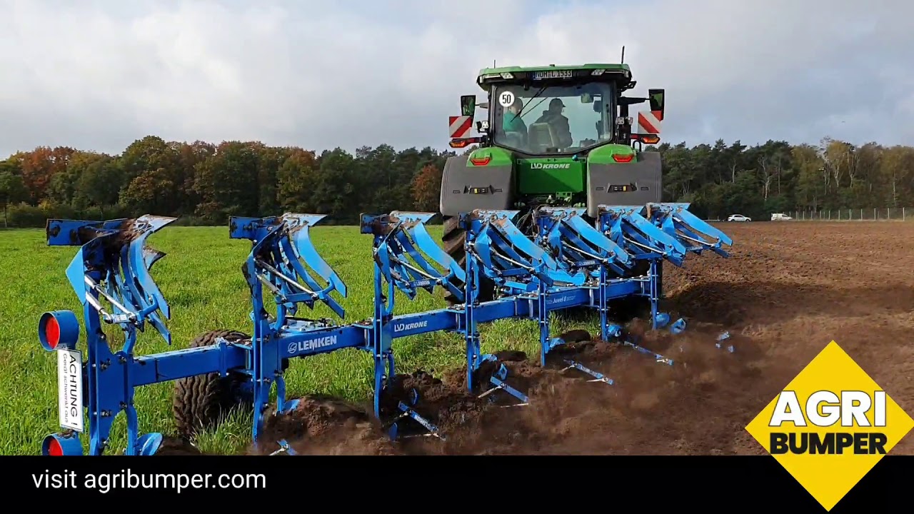 new model john-deere 7R270 on the 7 furrow Lemken plough and 1800kg agribumper