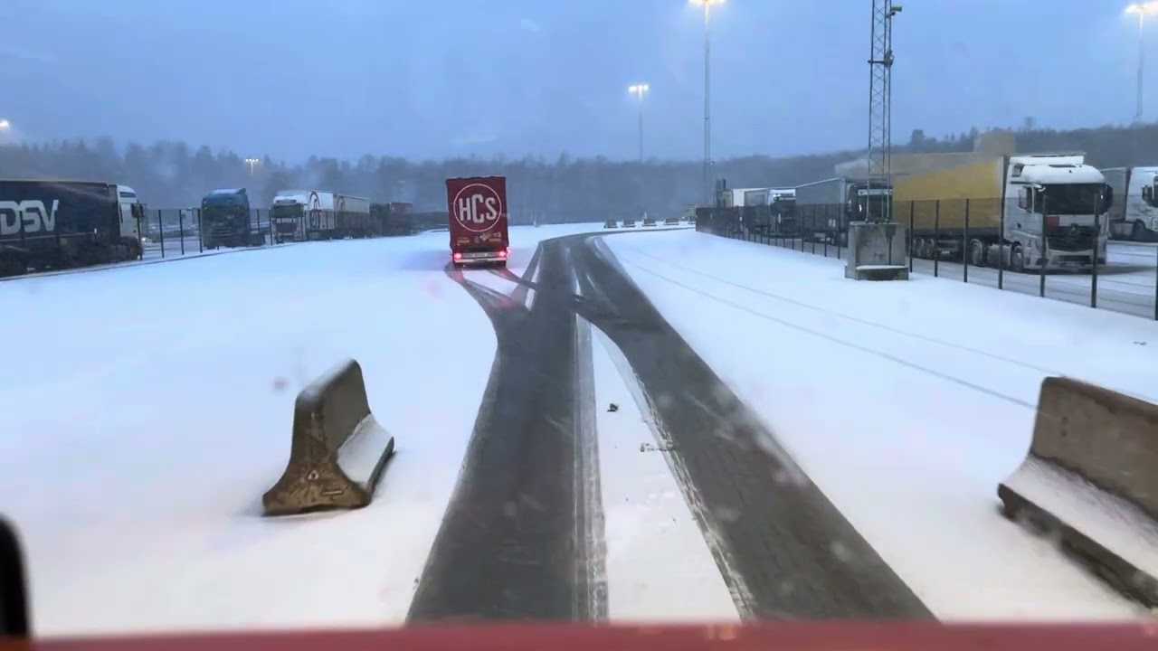 Driving the truck out from baltic princess and the harbor in to bad snow weather
