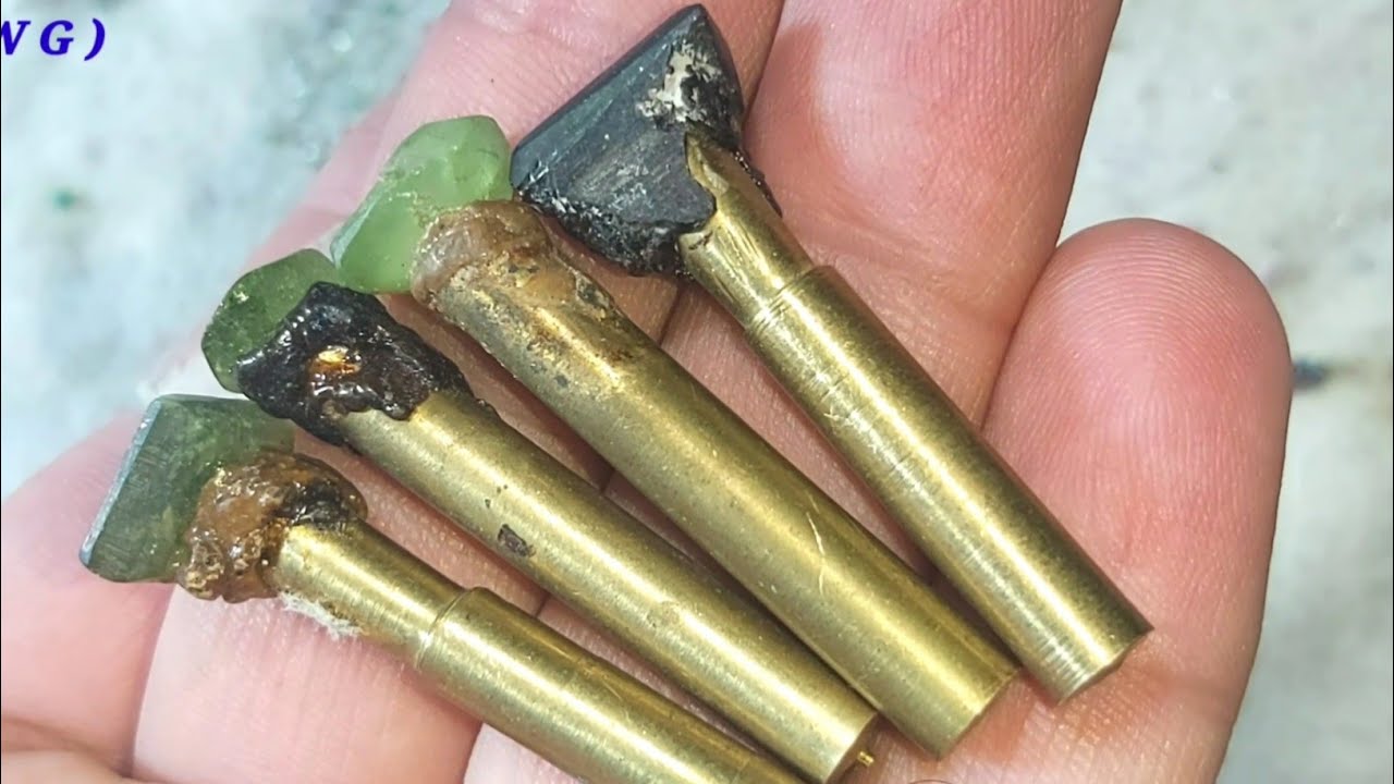 Different gemstones on doping sticks | How are stones prepared before carving?