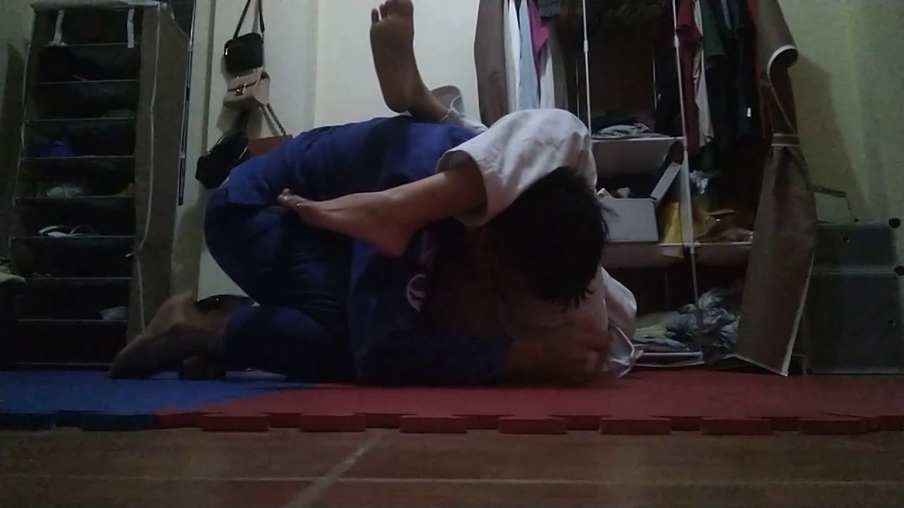 Jiu jitsu couple flow roll