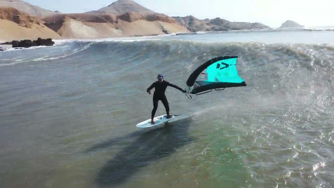 Amit Inbar wing foil on the longest wave in the world - perfect chicama wing foil  surf camp
