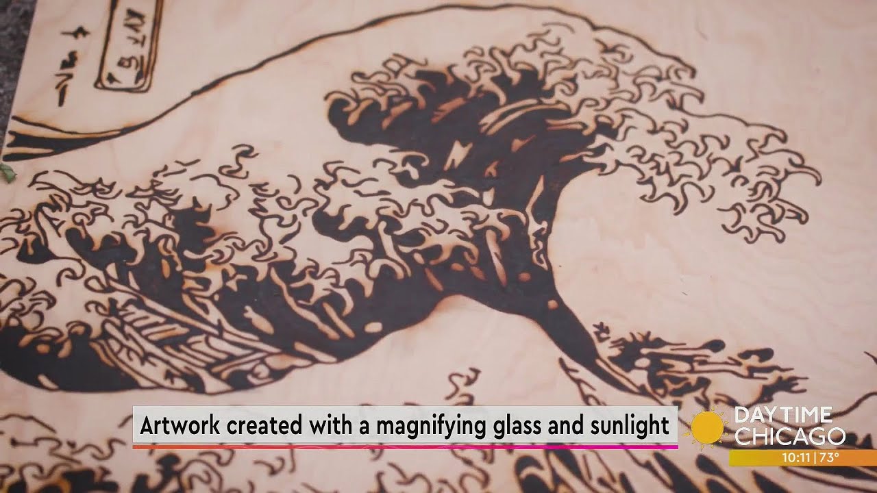 Artwork created with a magnifying glass and sunlight