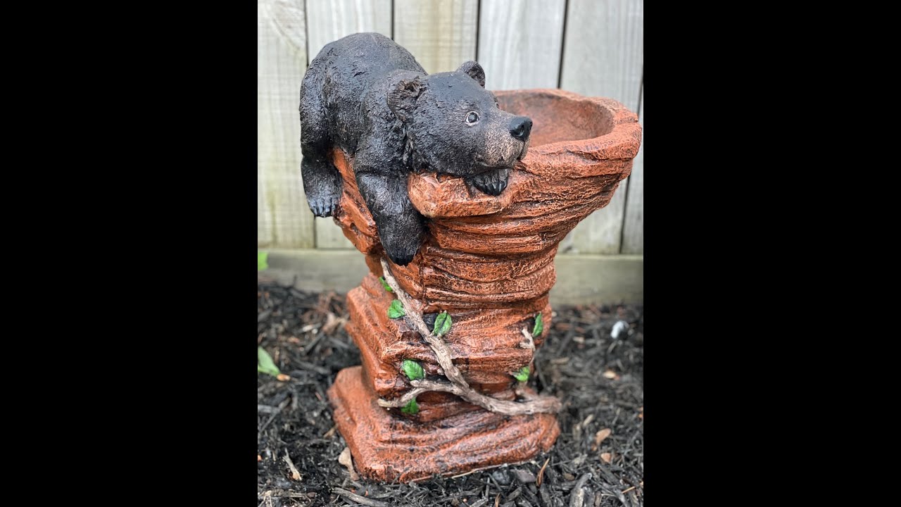 Contrasting bear birdbath