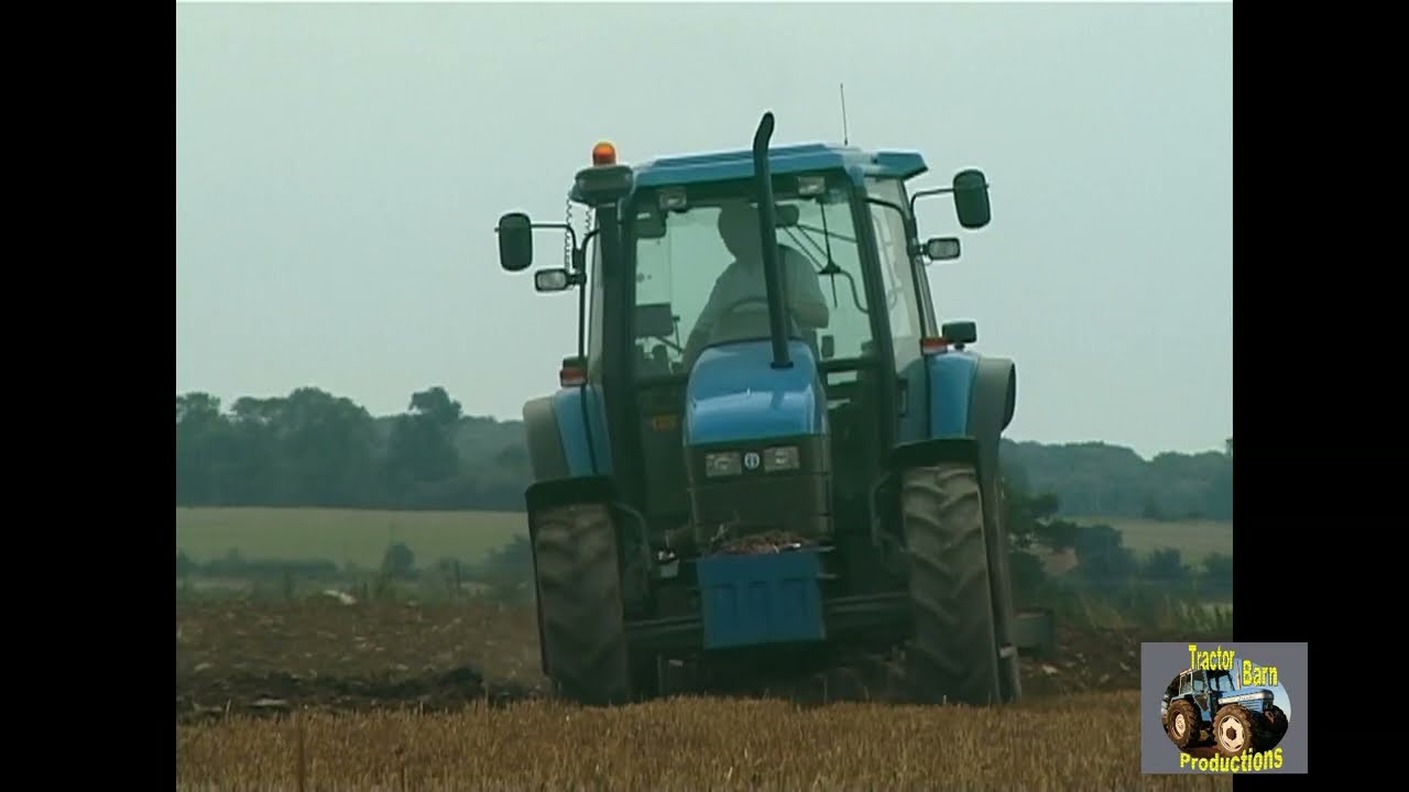 NEW HOLLAND TS110 AND RANSOMES PLOUGH