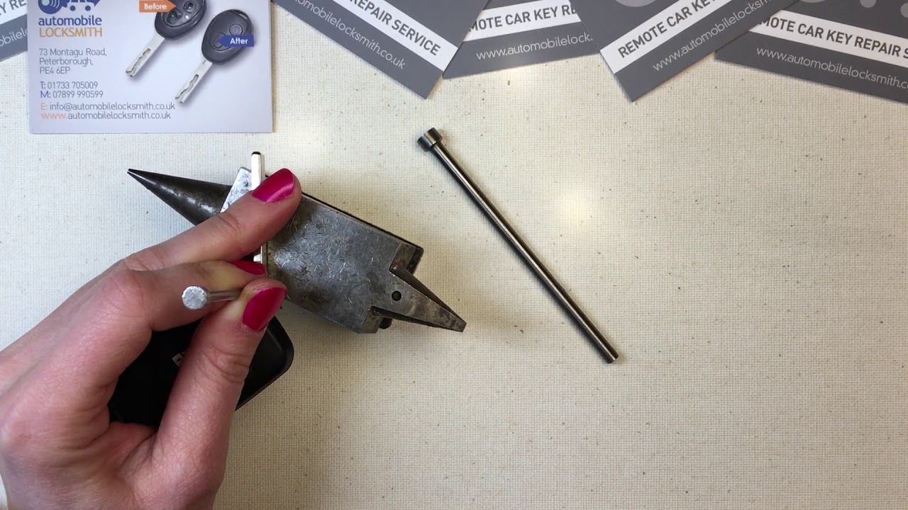 How to remove a pin from the flip key blade