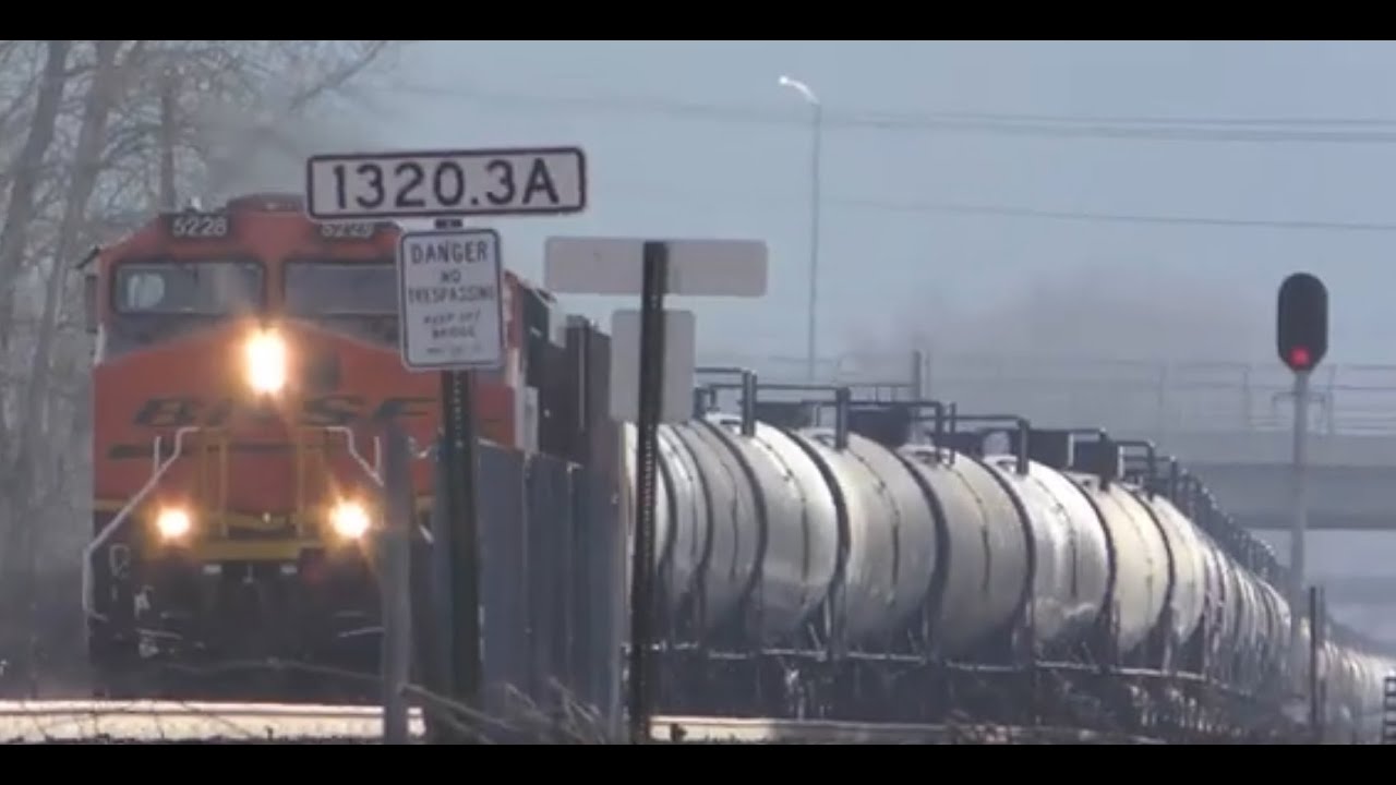 Several Grain Trains and an Oil Train Ducks into the Siding to allow a Z Train to Overtake It 4K