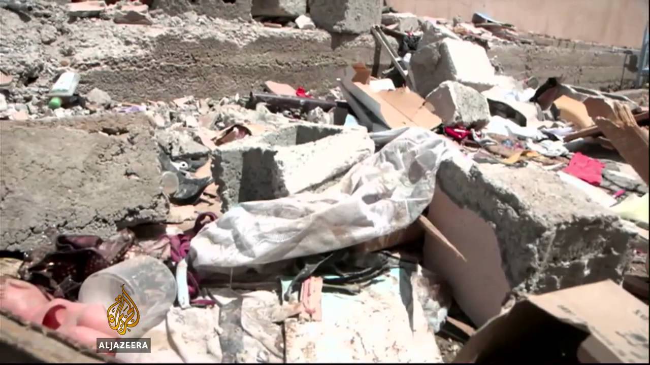 Kurds fight Iraqi government and rebels for territory
