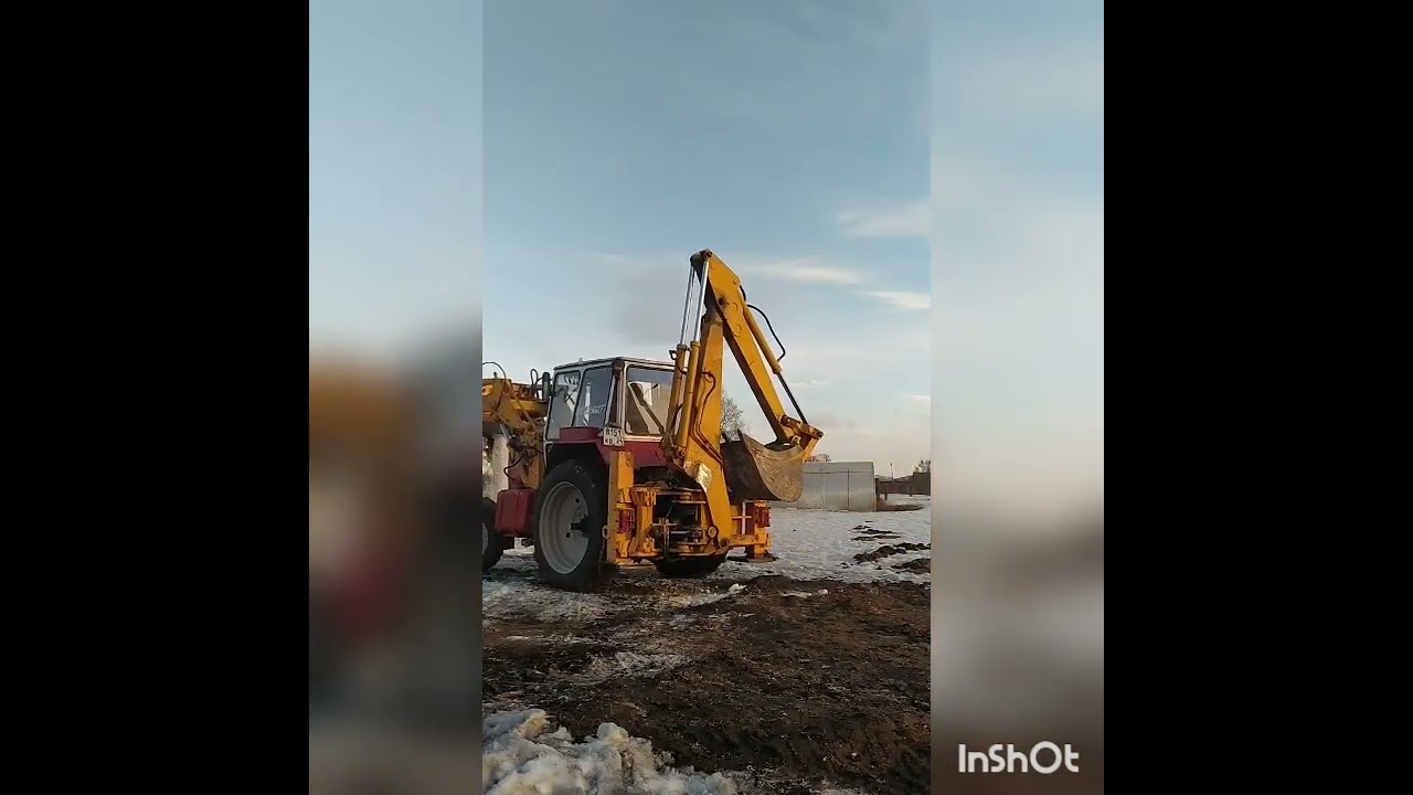 экскаватор-погрузчик ЮМЗ