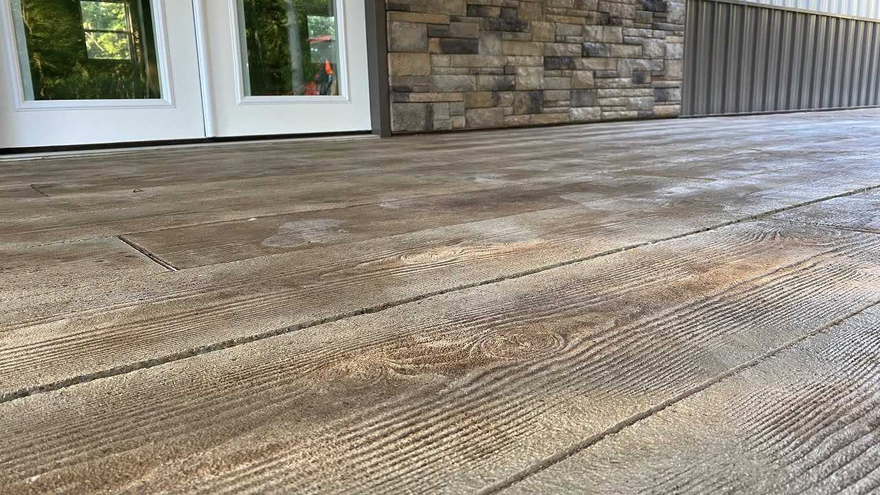 Is it WOOD PLANK? No, It's actually Concrete! Beautiful Patio idea